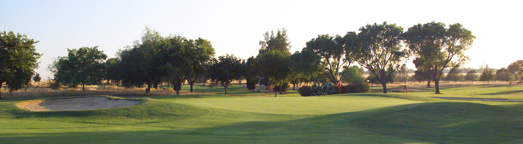 Wide fairways and tree-lined greens at Mather Golf Course in Mather, CA